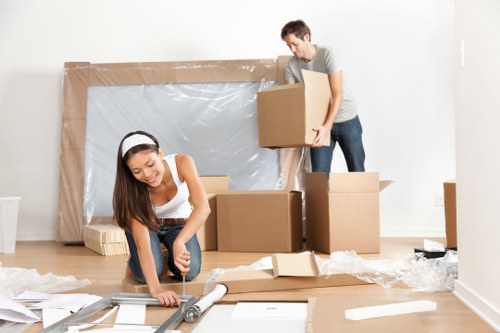 Man loading furniture into a van