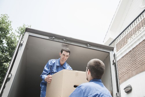 Man and Van team loading furniture into truck