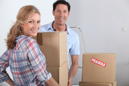 Professional movers assisting with loading